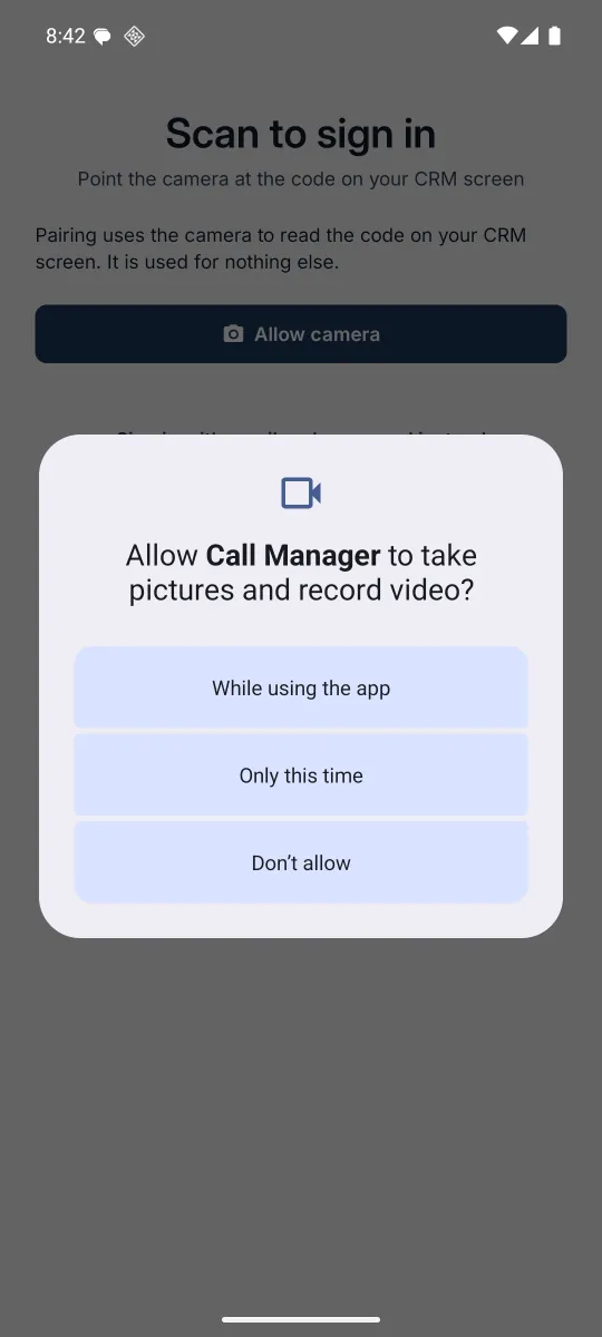 The app's QR scanning screen asking for camera permission